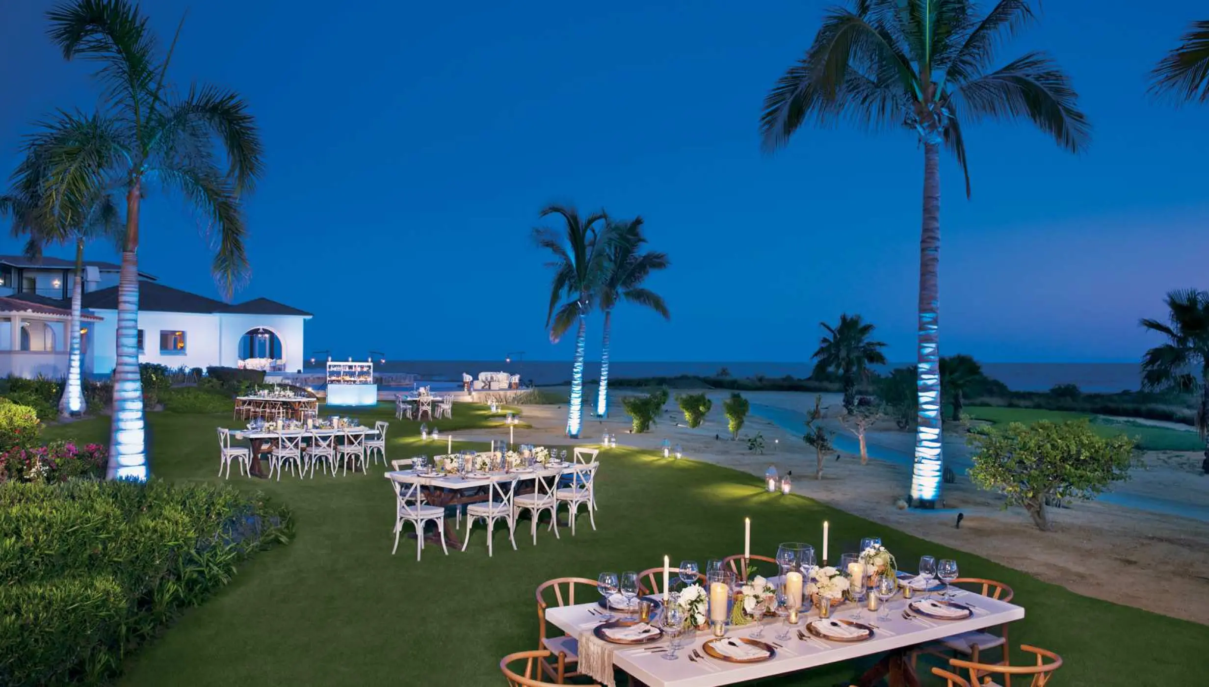 Evening wedding reception on the Oceana Garden lawn at Secrets Puerto Los Cabos, Cabo San Lucas