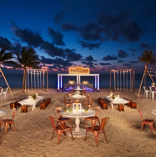 Cocktail party on the beach wedding venue at Secrets Riviera Cancun