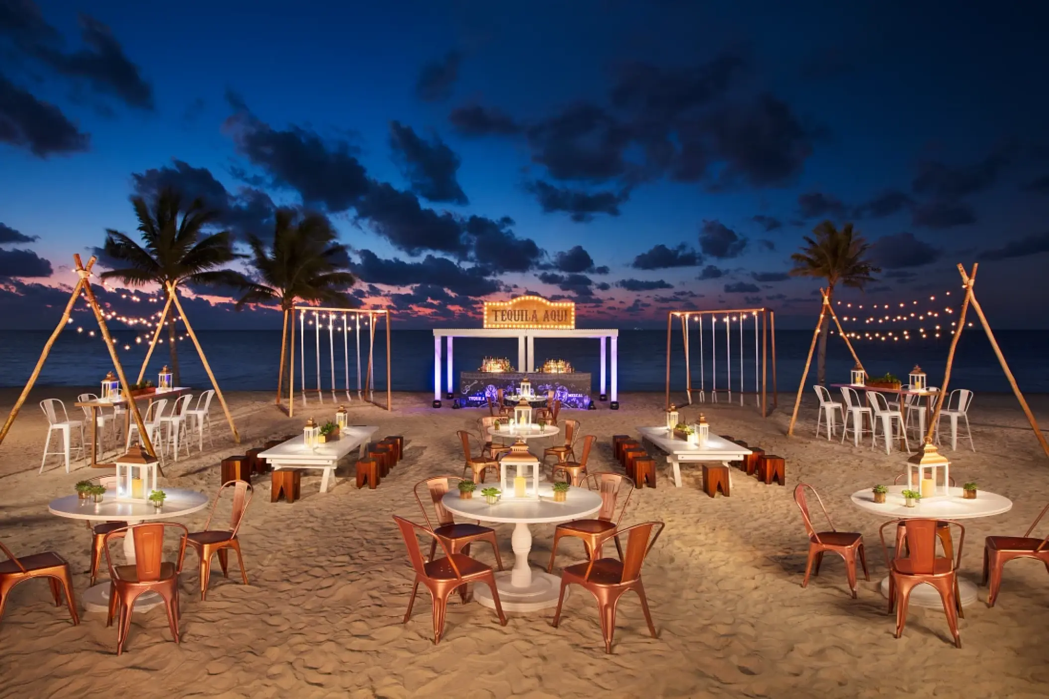 Beachfront wedding reception setup at Secrets Riviera Cancun, Riviera Maya