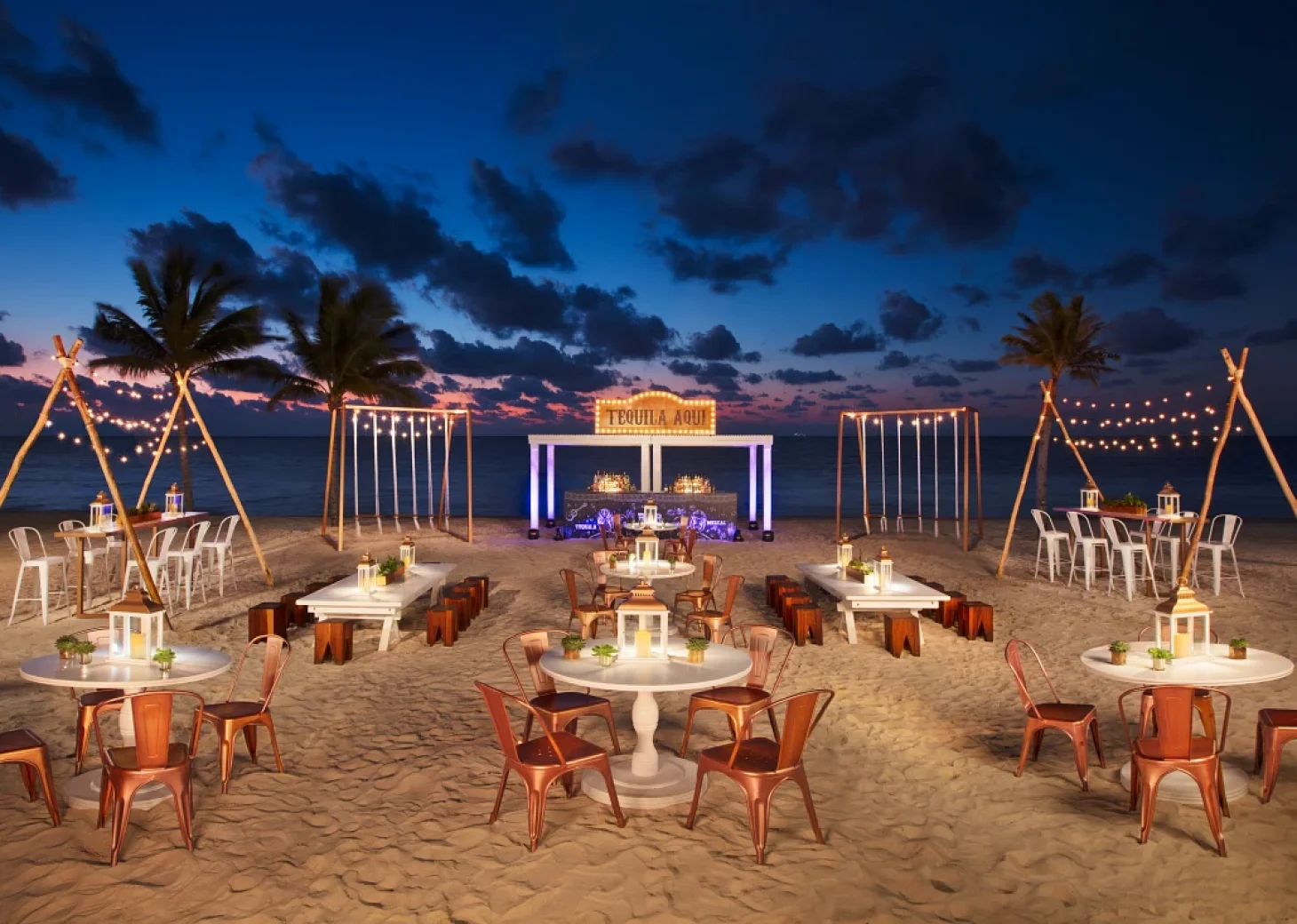 Cocktail party on the beach wedding venue at Secrets Riviera Cancun