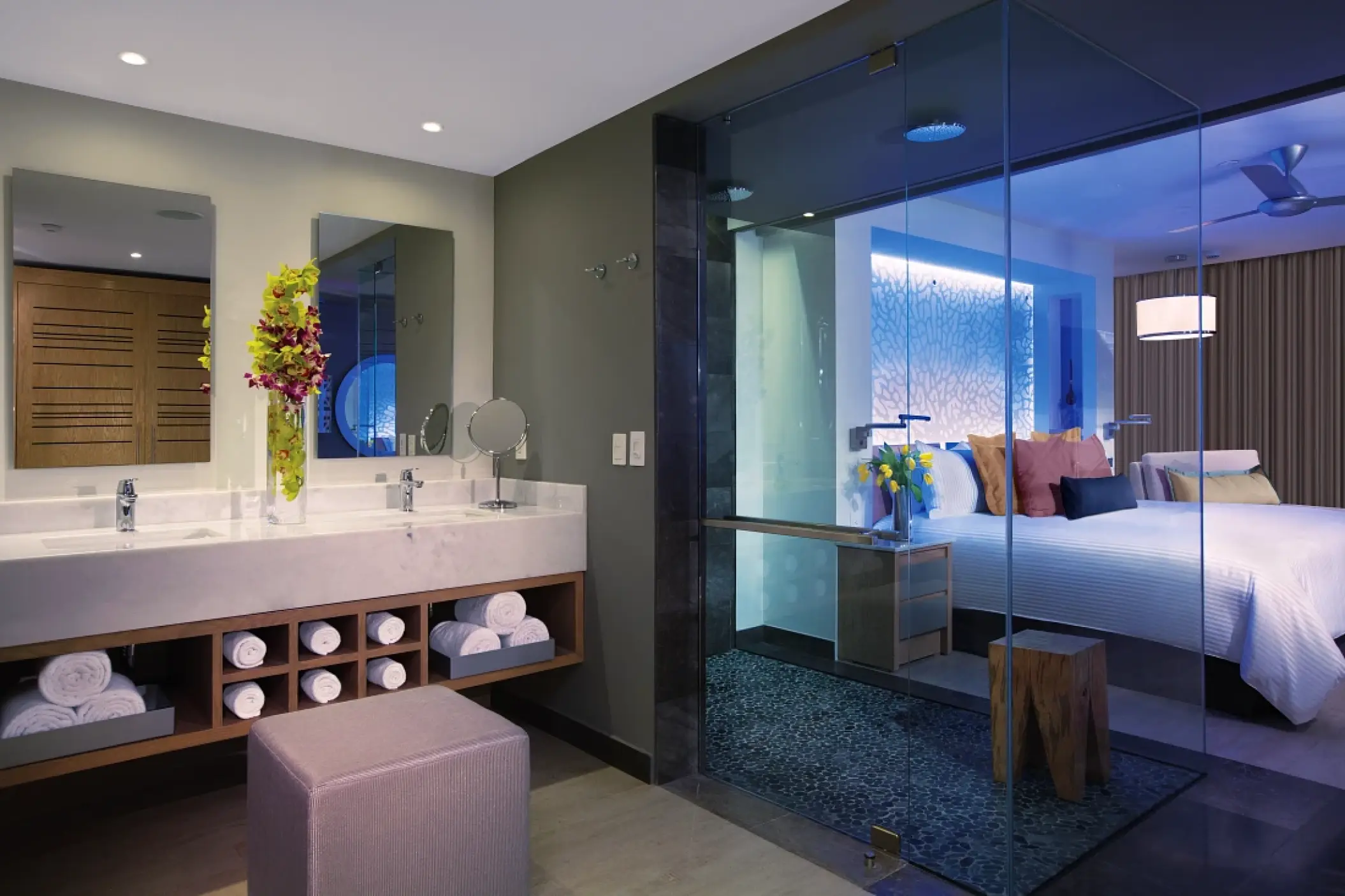 Modern bathroom and glass shower partition in a junior suite at Secrets Riviera Cancun, Riviera Maya