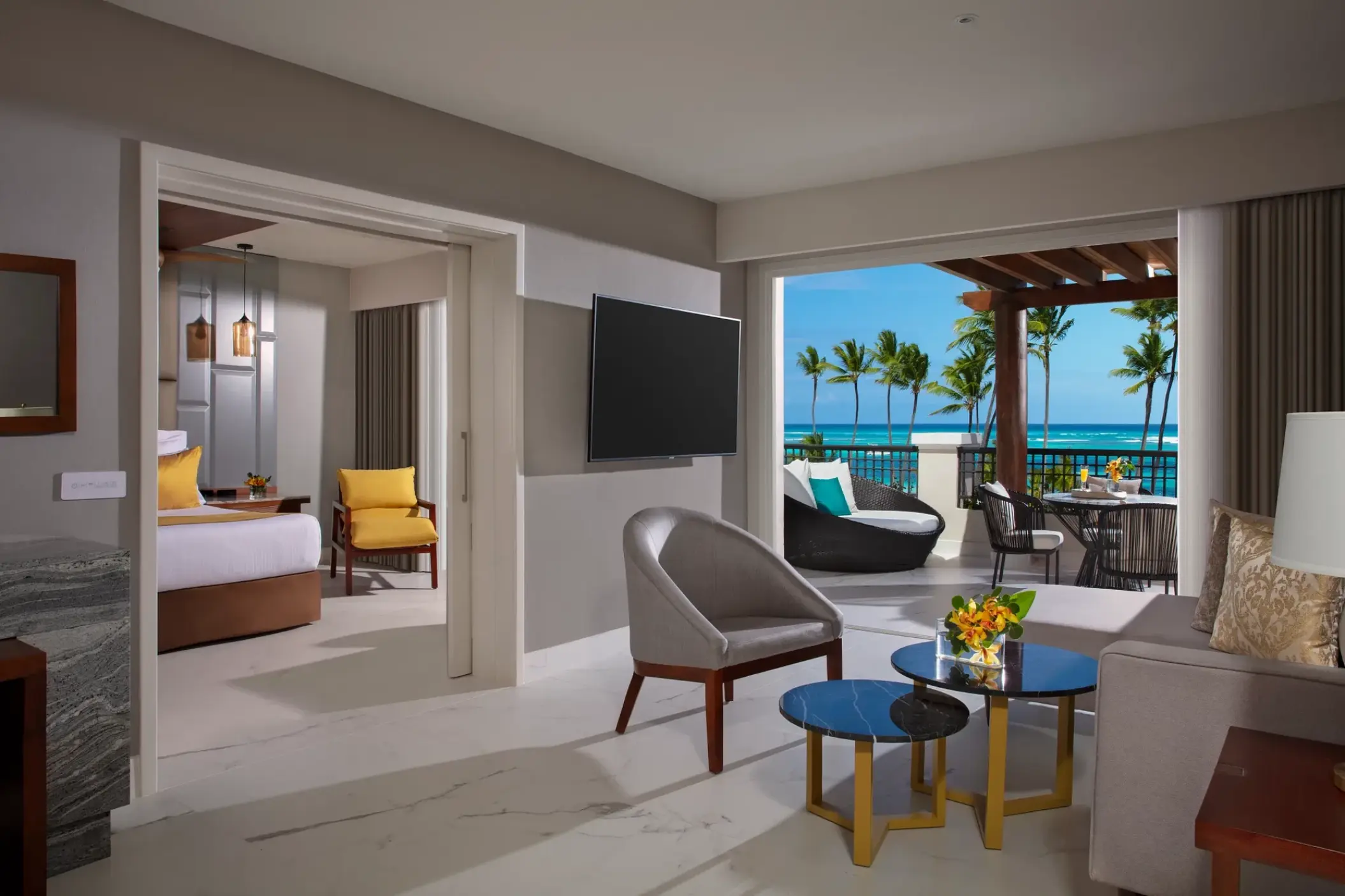 Master suite living area and balcony with ocean views at Secrets Royal Beach, Punta Cana