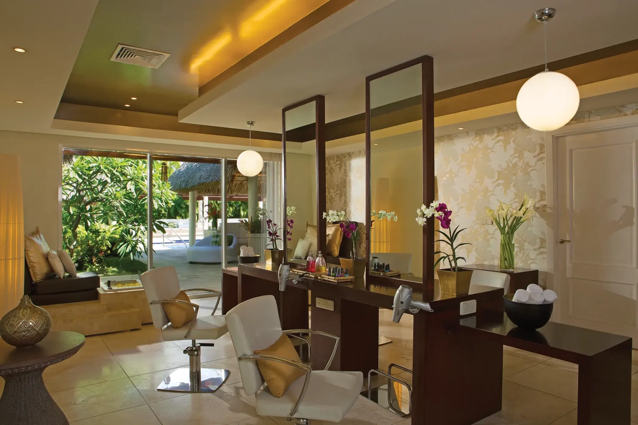 Beauty salon with styling stations and tall mirrors at Secrets Royal Beach, Punta Cana