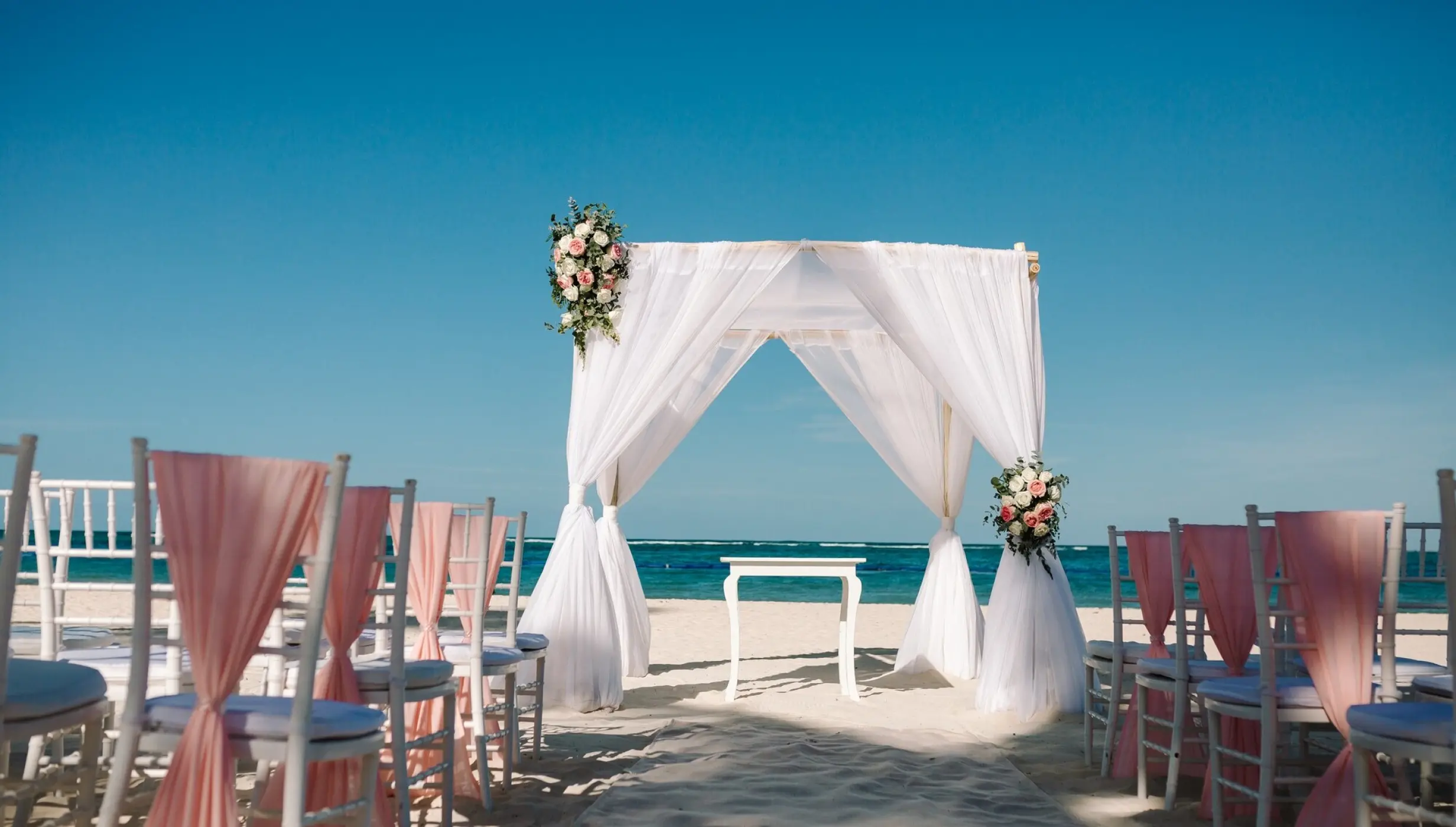 Ceremony decor in the beach at Secrets Royal Beach Punta Cana