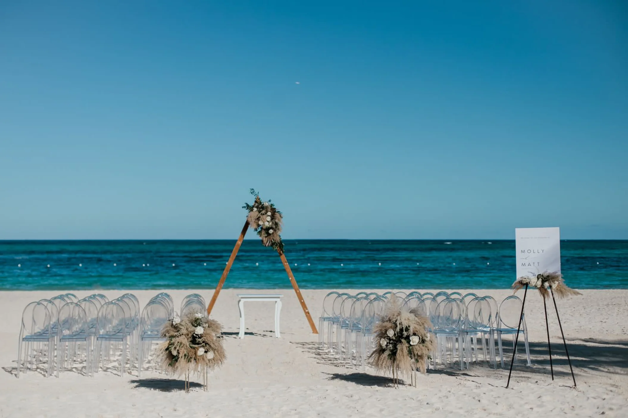 Ceremony decor in the beach at Secrets Royal Beach Punta Cana