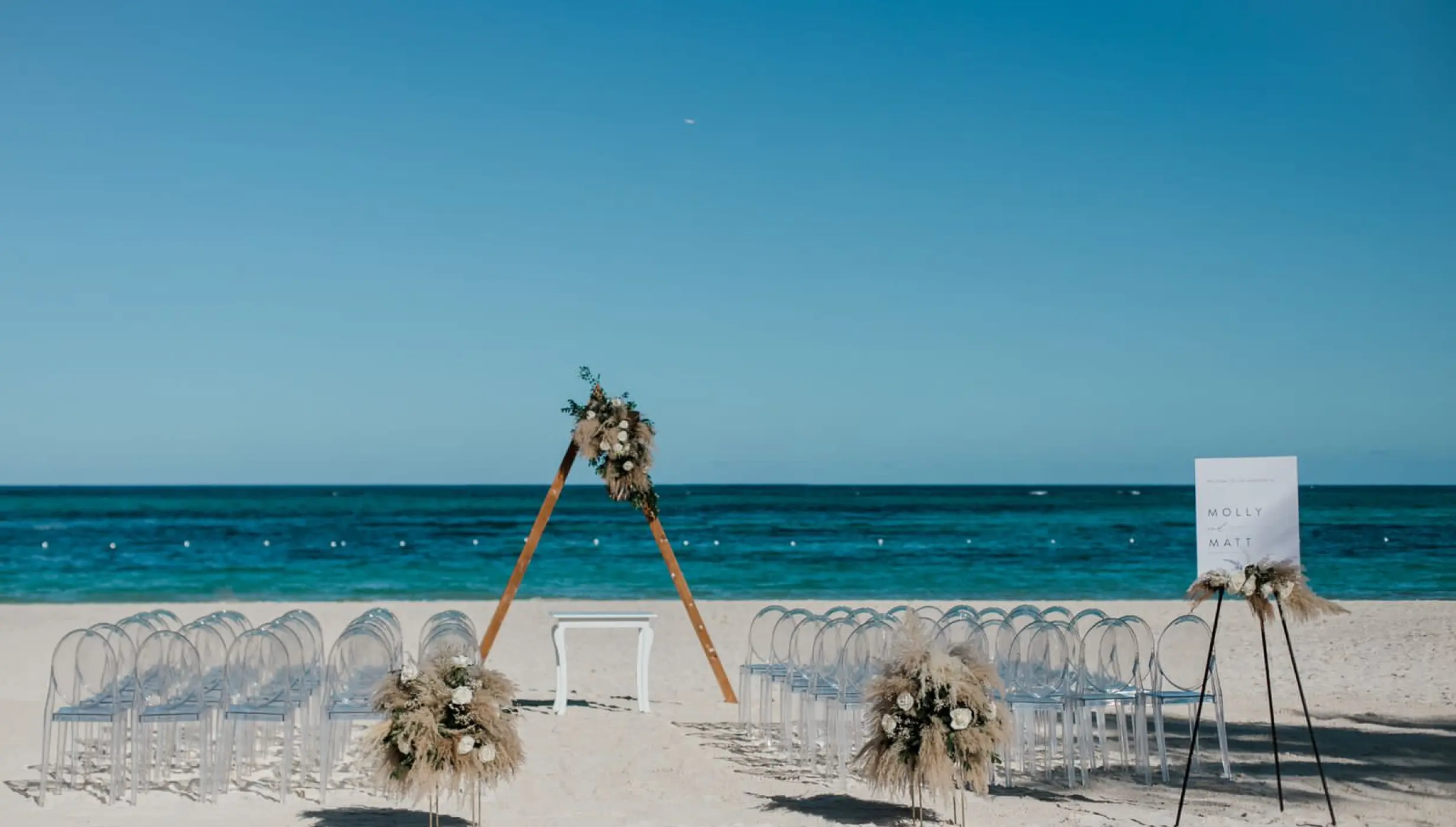 Ceremony decor in the beach at Secrets Royal Beach Punta Cana