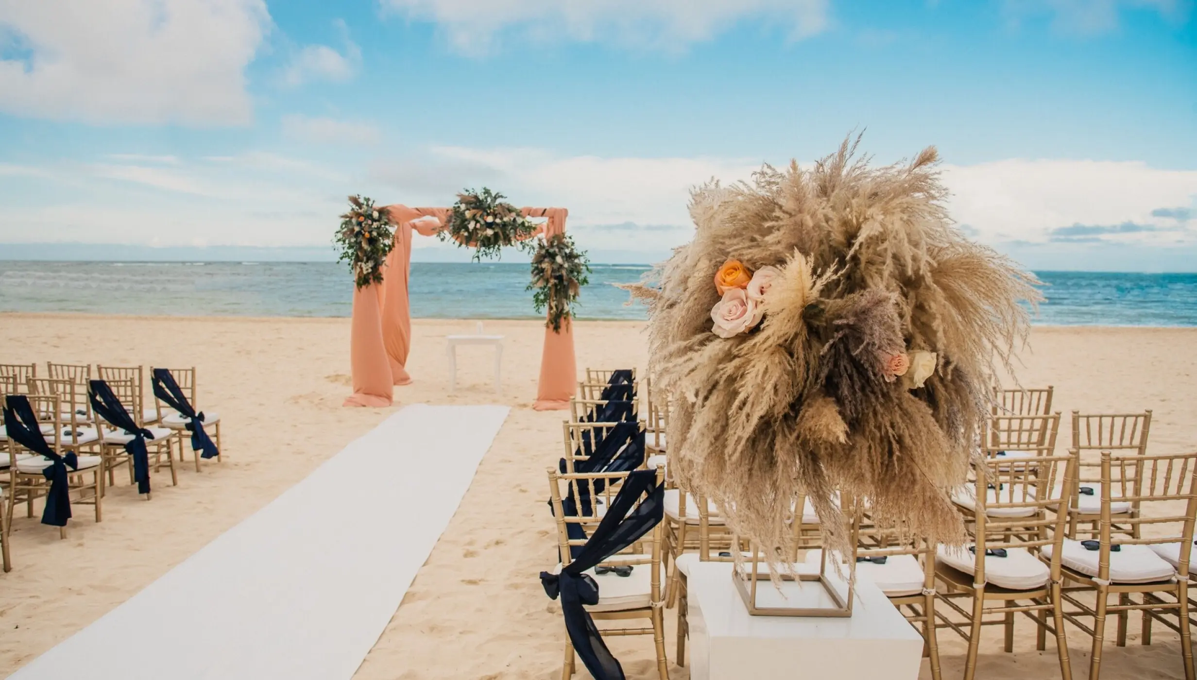 Ceremony decor in the beach at Secrets Royal Beach Punta Cana