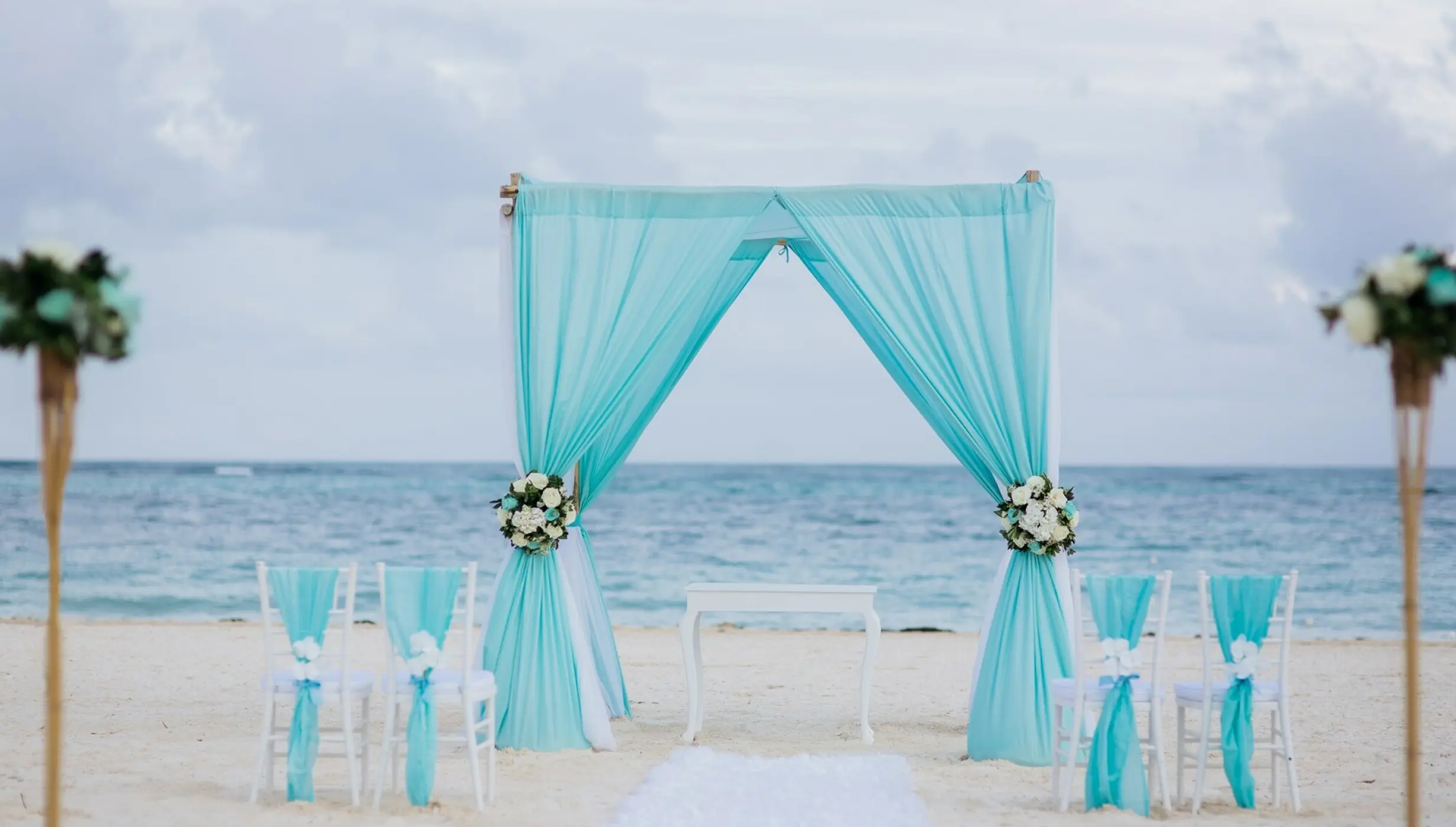 Ceremony decor in the beach at Secrets Royal Beach Punta Cana