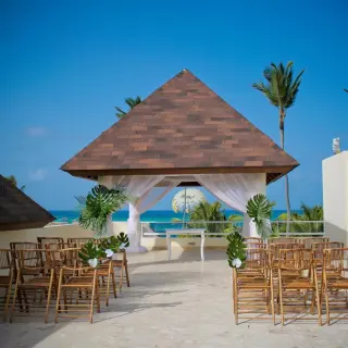 Terrace wedding ceremony under a gazebo at Secrets Royal Beach, Punta Cana