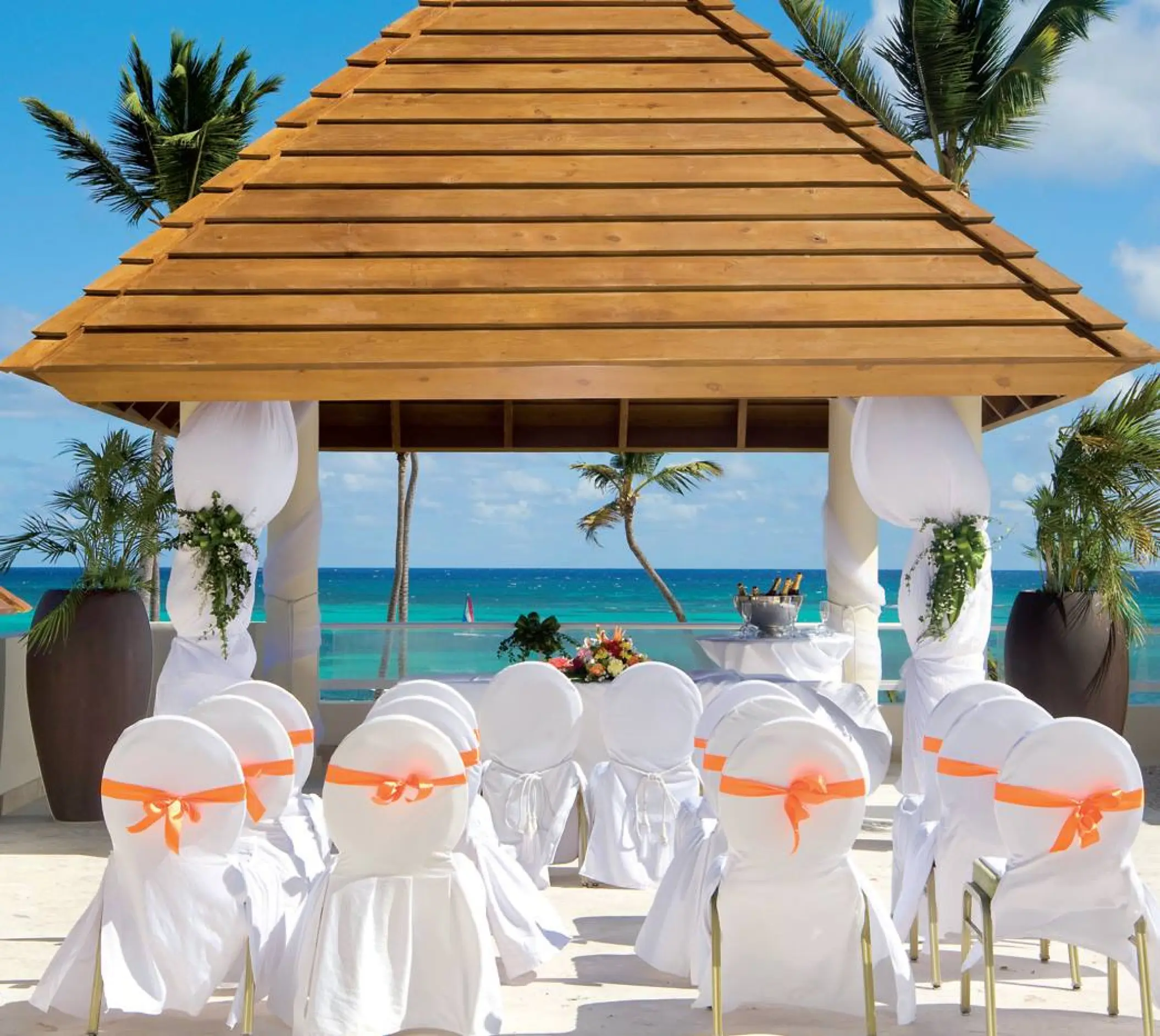 Wooden gazebo wedding ceremony at Secrets Royal Beach, Punta Cana