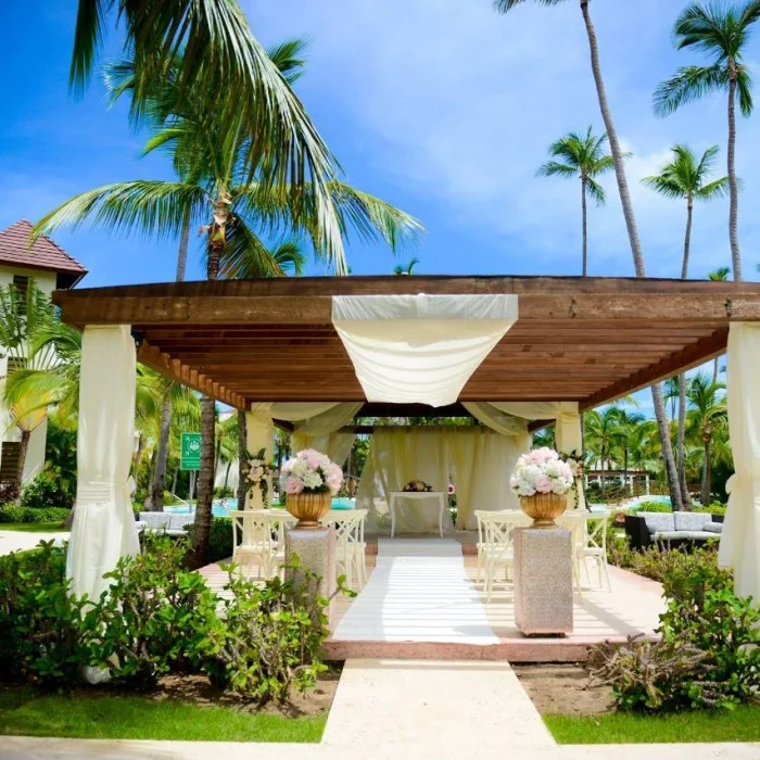 Ceremony decor in the tropical garden at Secrets Royal Beach Punta Cana