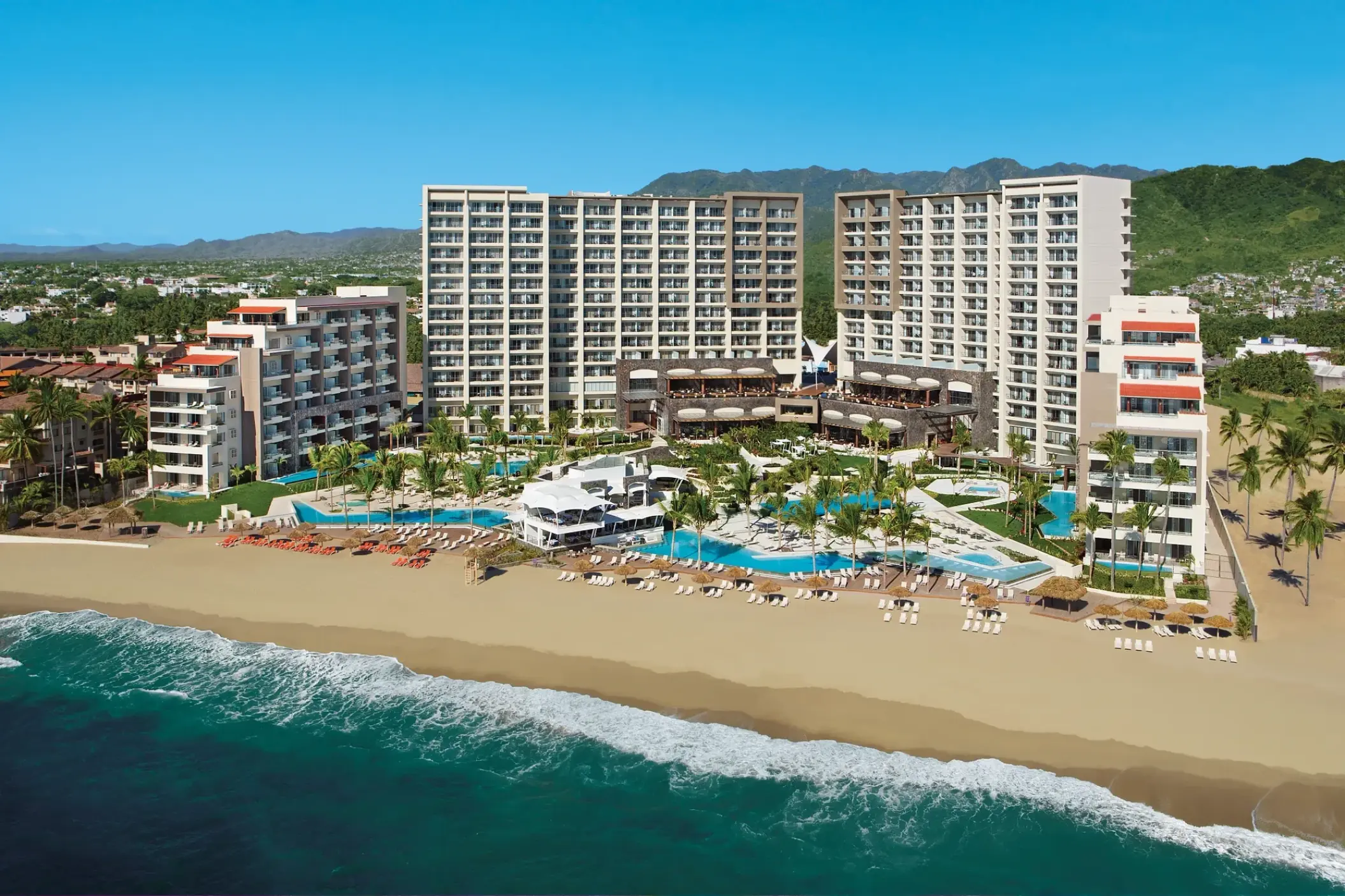 Aerial view of Secrets Vallarta Bay beachfront pools and buildings, Puerto Vallarta
