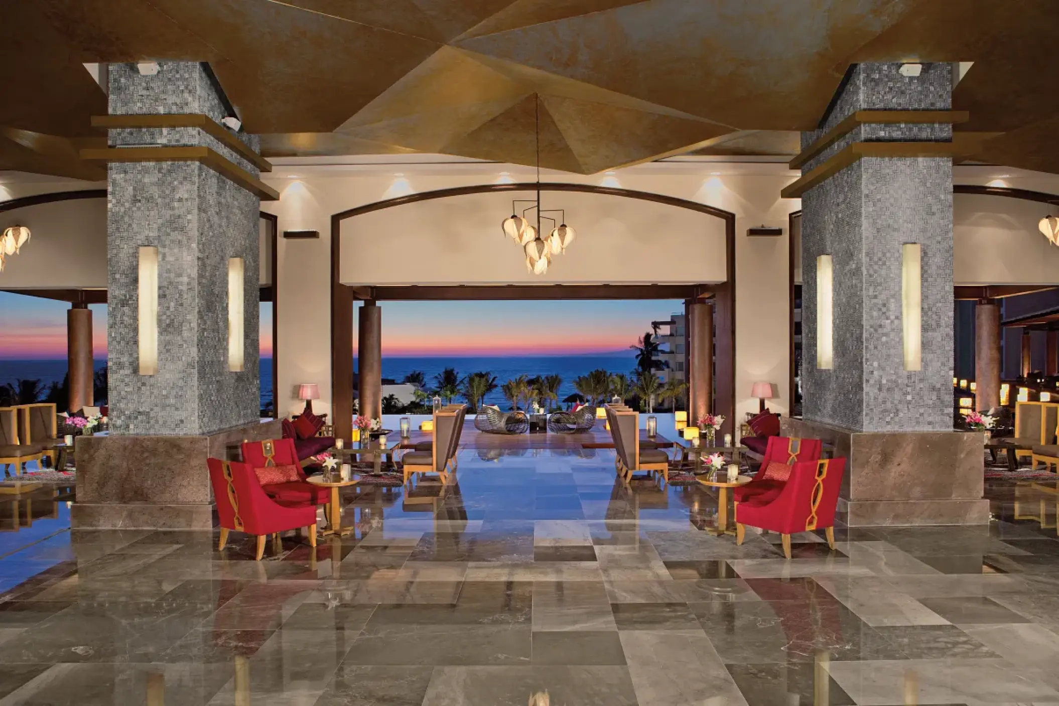 Secrets Vallarta Bay lobby lounge with ocean views at sunset, Puerto Vallarta