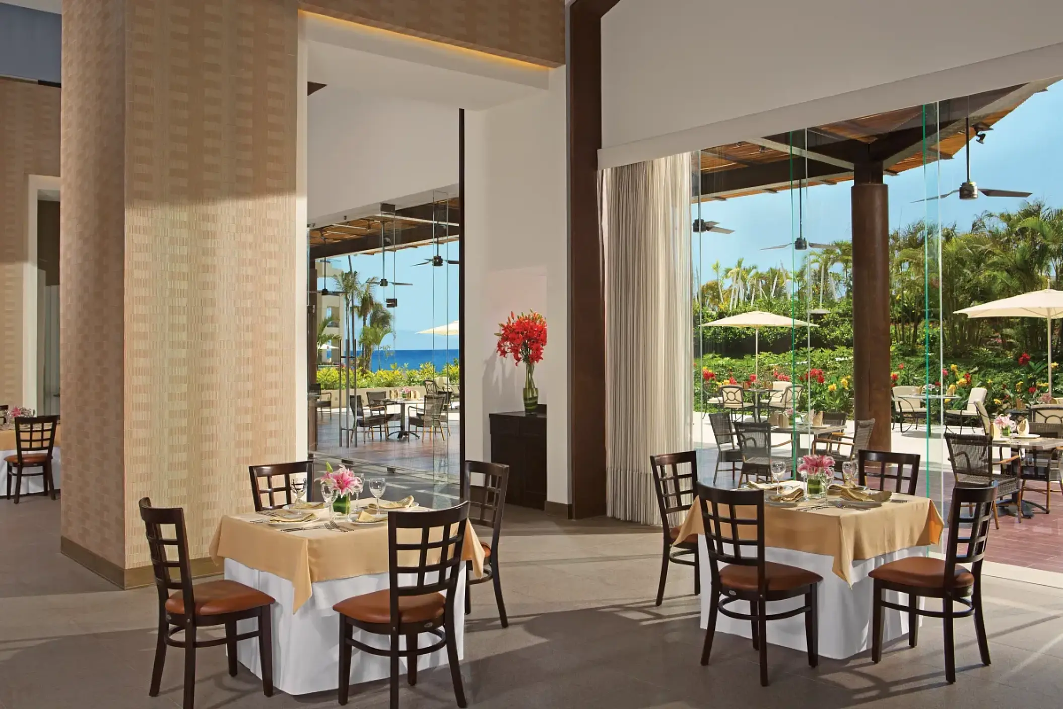 Market Cafe dining area with indoor and outdoor seating at Secrets Vallarta Bay, Puerto Vallarta