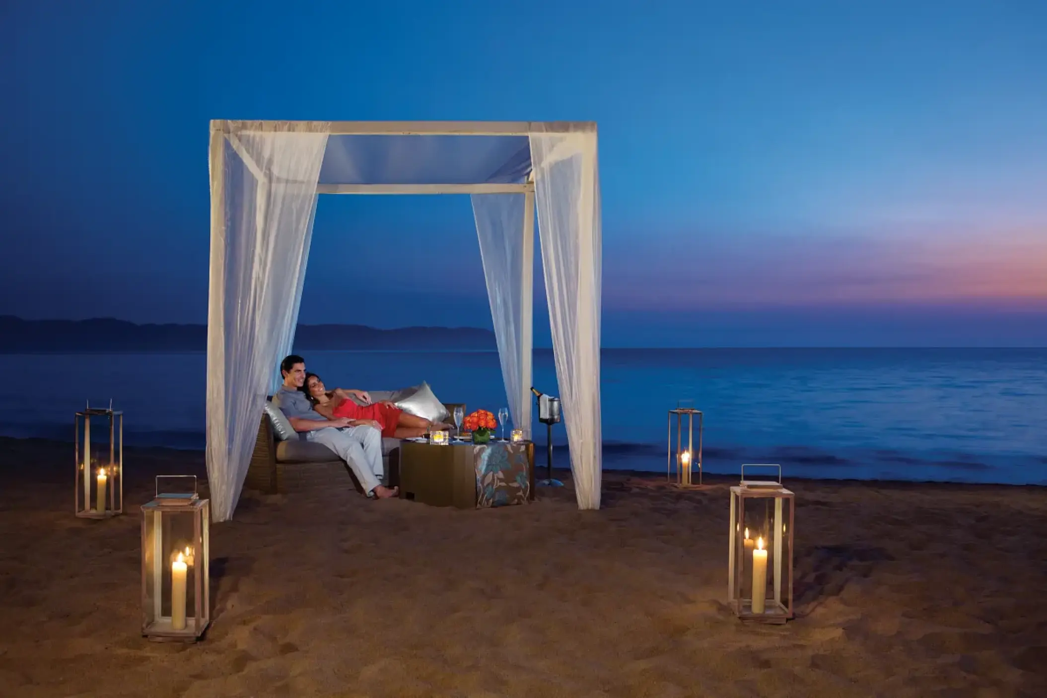 Private beach dinner for a couple under a cabana at Secrets Vallarta Bay, Puerto Vallarta