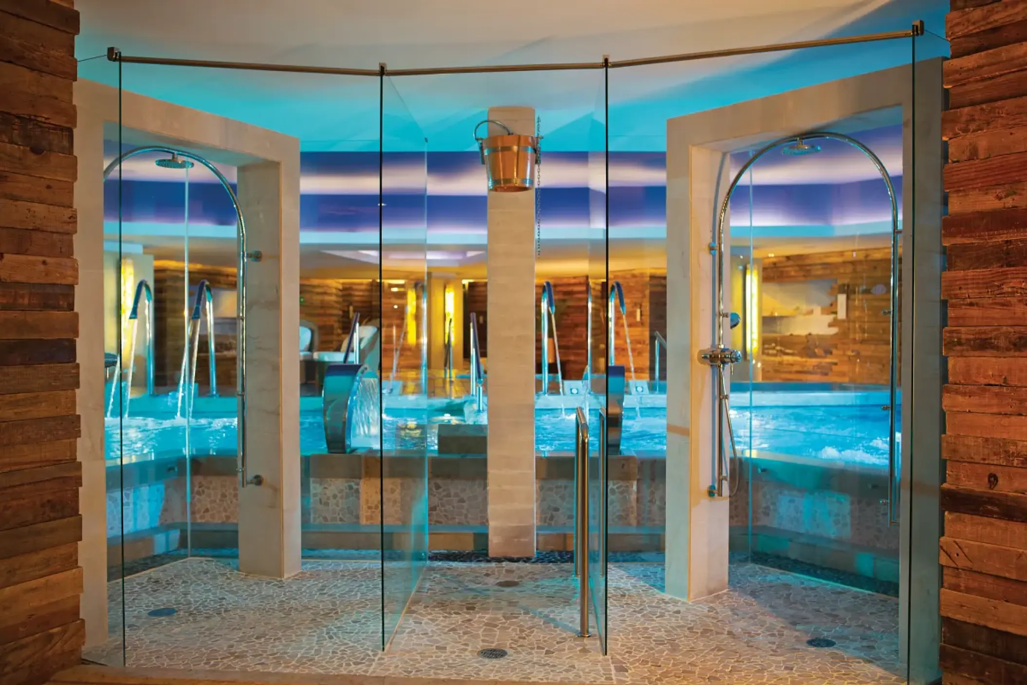Hydrotherapy circuit showers and indoor pool at Secrets Vallarta Bay, Puerto Vallarta