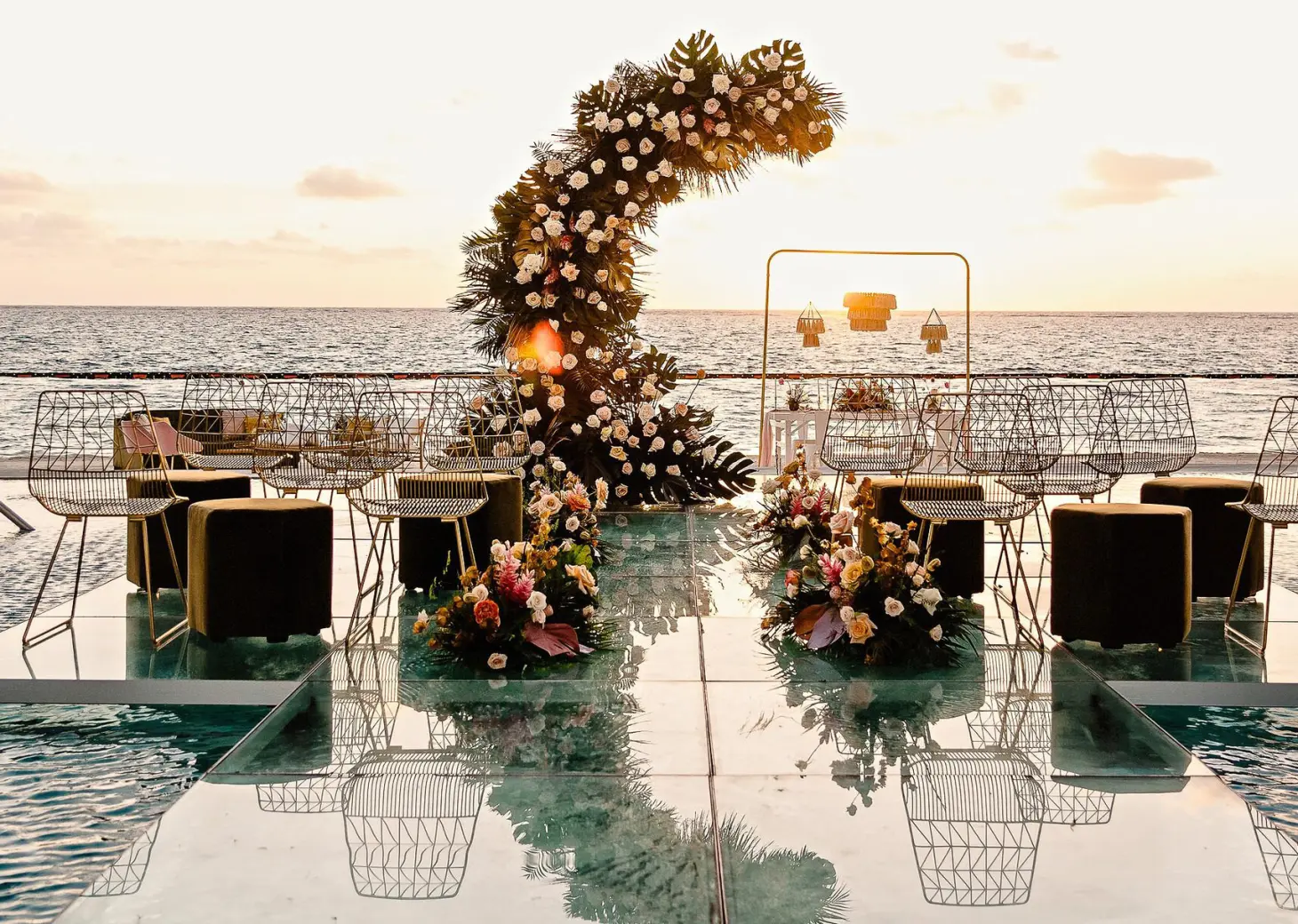 Acrylic aisle and floral moon arch wedding ceremony at Sensira Resort, Riviera Maya