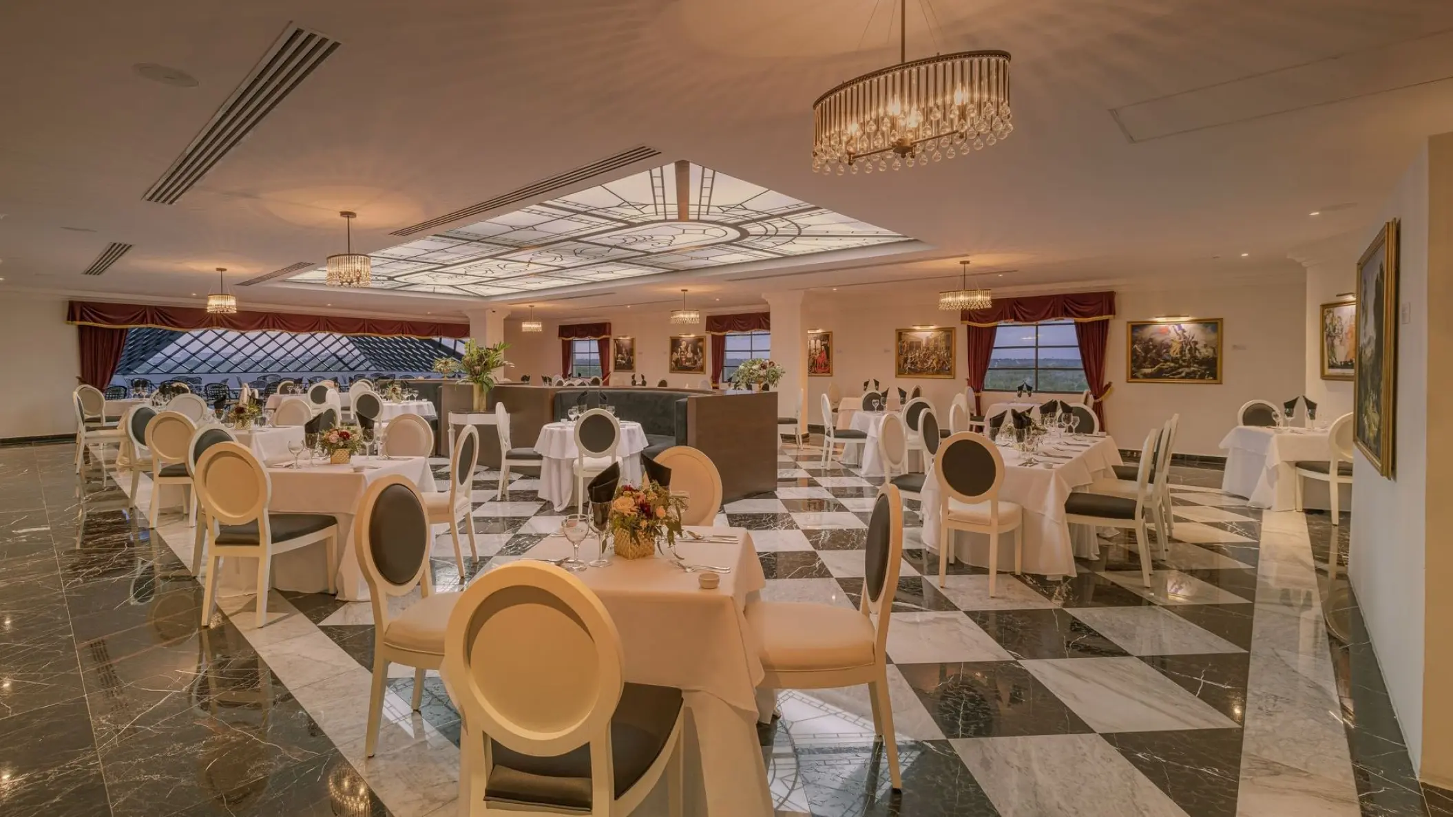 Galerie des Sens dining room with checkered floors at Sensira Resort, Riviera Maya