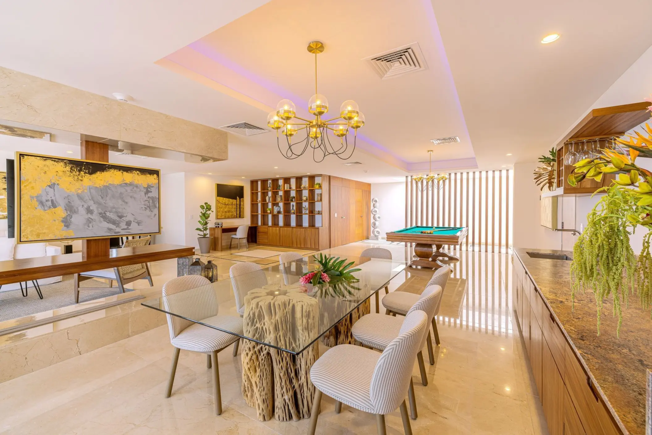 Diamond Suite living and dining area with pool table at Sensira Resort, Riviera Maya