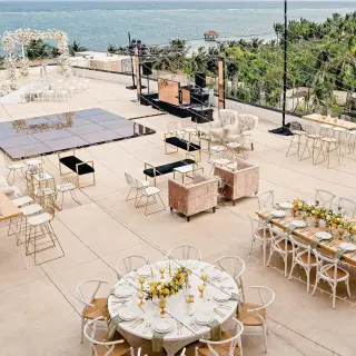 Rooftop terrace wedding reception setup with dance floor at Sensira Resort, Riviera Maya