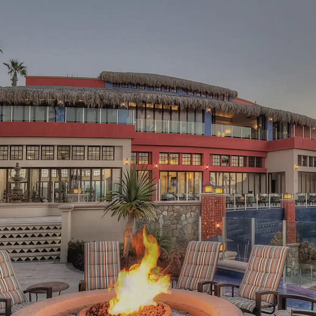 Main pool and restaurant with a fire pit at Hyatt Vacation Club Sirena del Mar, Cabo San Lucas
