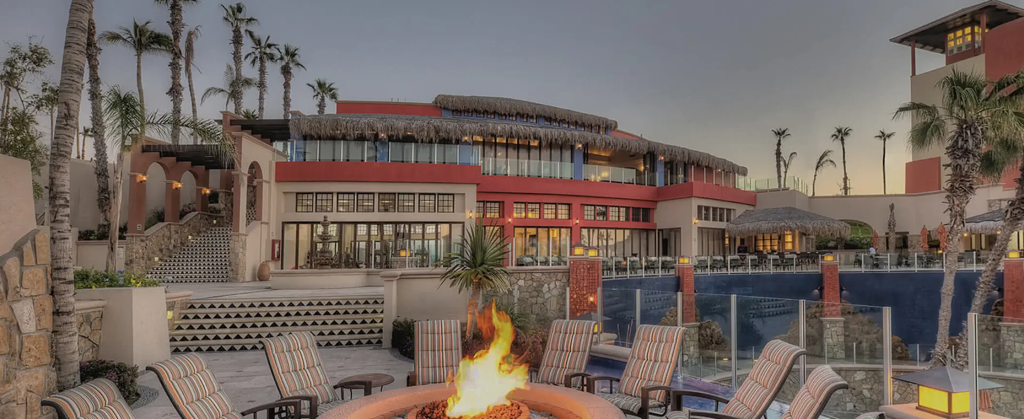 Main pool and restaurant with a fire pit at Hyatt Vacation Club Sirena del Mar, Cabo San Lucas