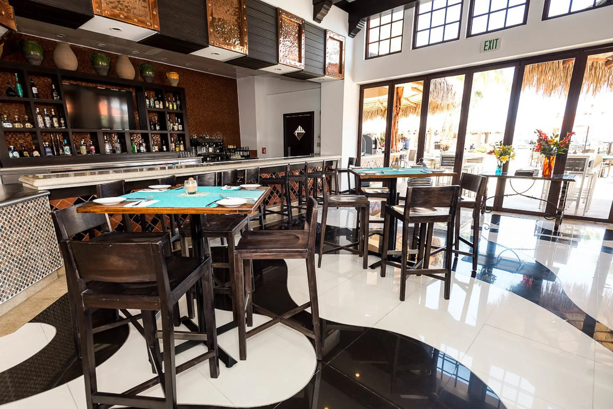 Indoor bar area and lounge seating at Hyatt Sirena del Mar, Cabo San Lucas