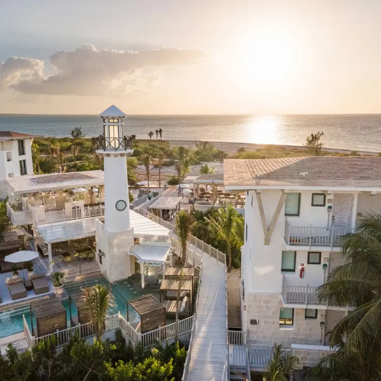 St. Somewhere Resort Holbox lighthouse and beachfront villas at sunset, Isla Holbox