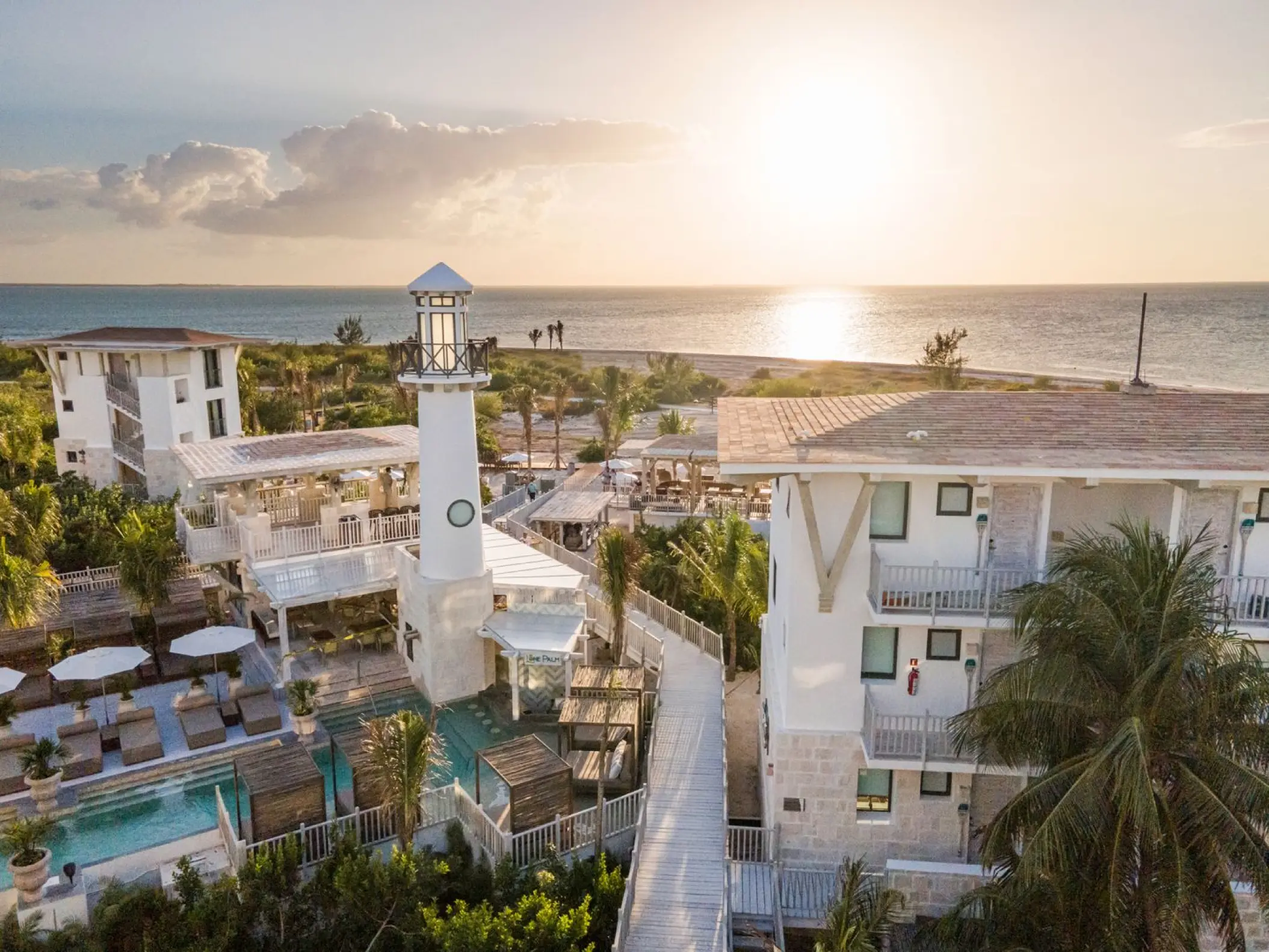 St. Somewhere Resort Holbox lighthouse and beachfront villas at sunset, Isla Holbox