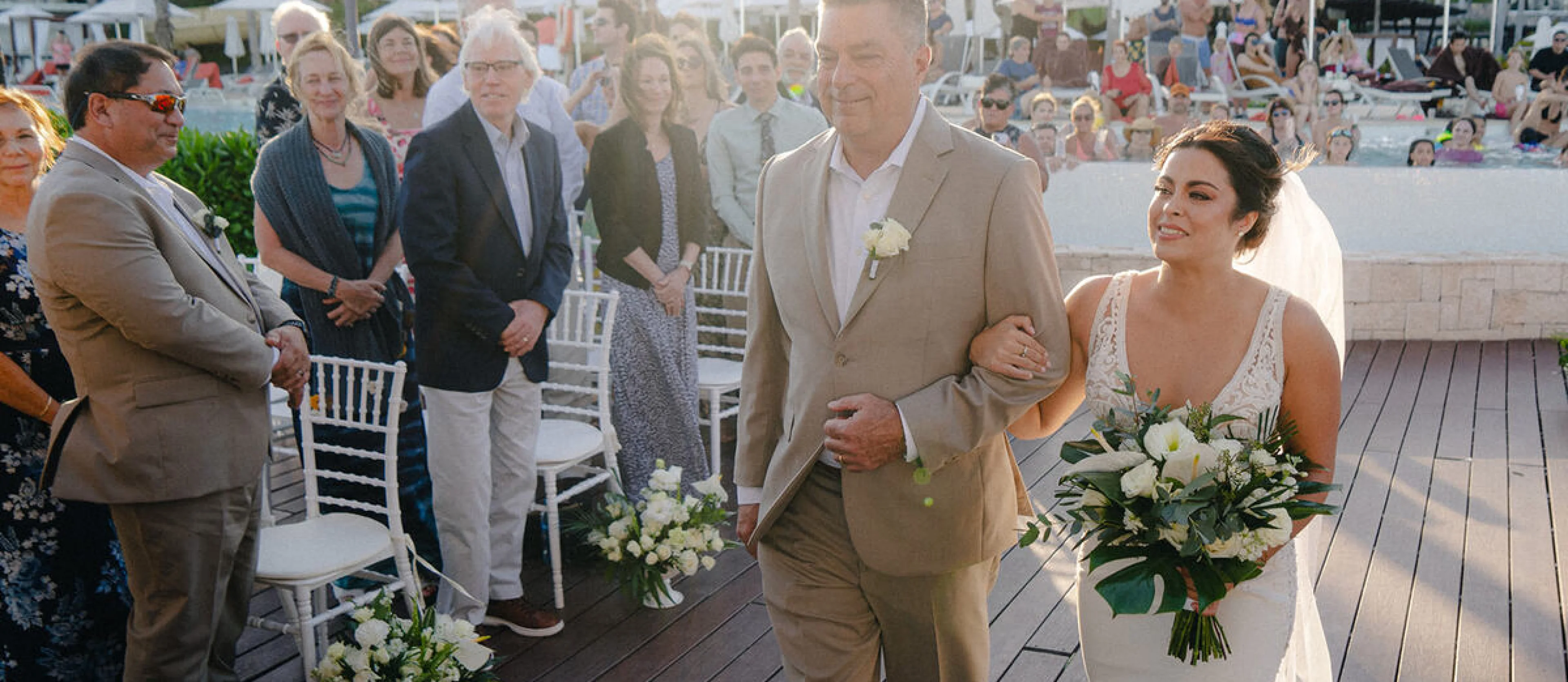 bride Alexis walks down the aisle