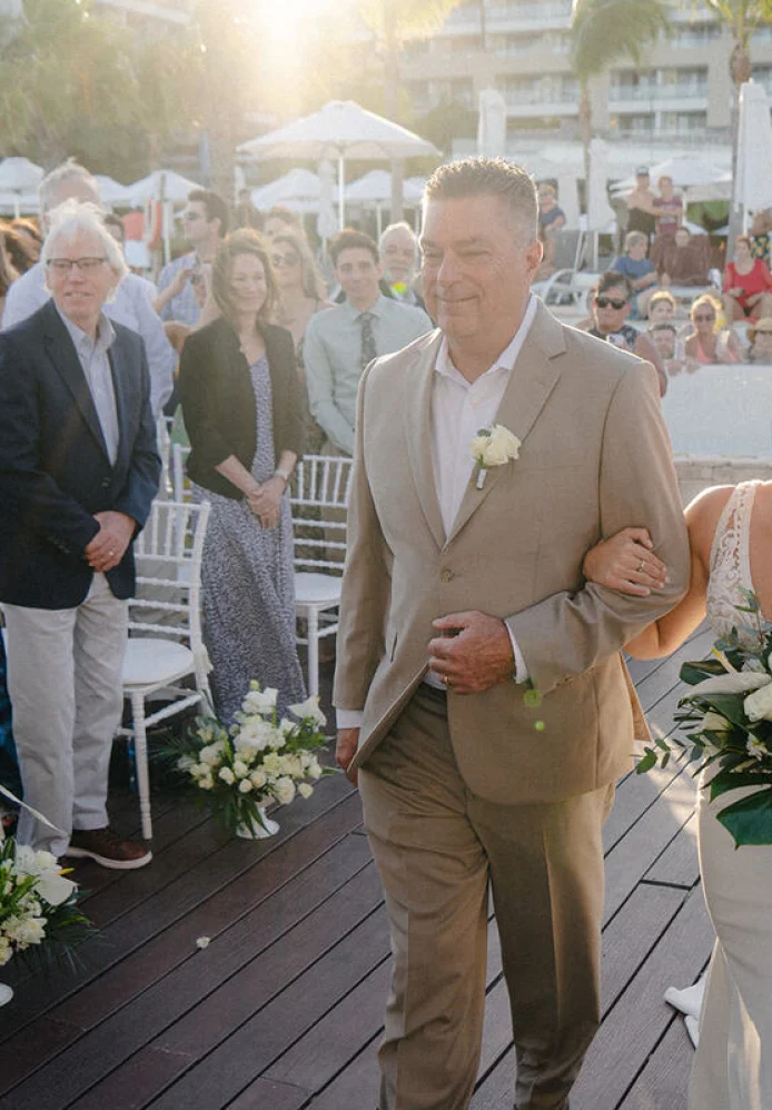 bride Alexis walks down the aisle