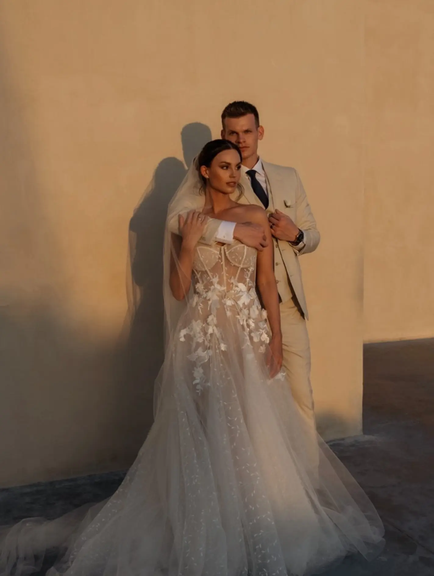 Julia & Justin posing for a golden hour wedding portrait at Secrets Tulum, Tulum