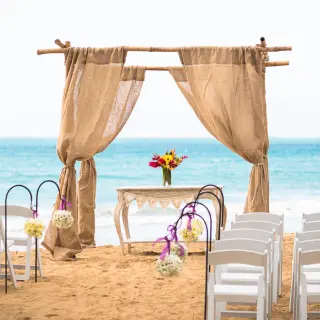 Beachfront wedding ceremony setup at Sublime Samaná, Samana