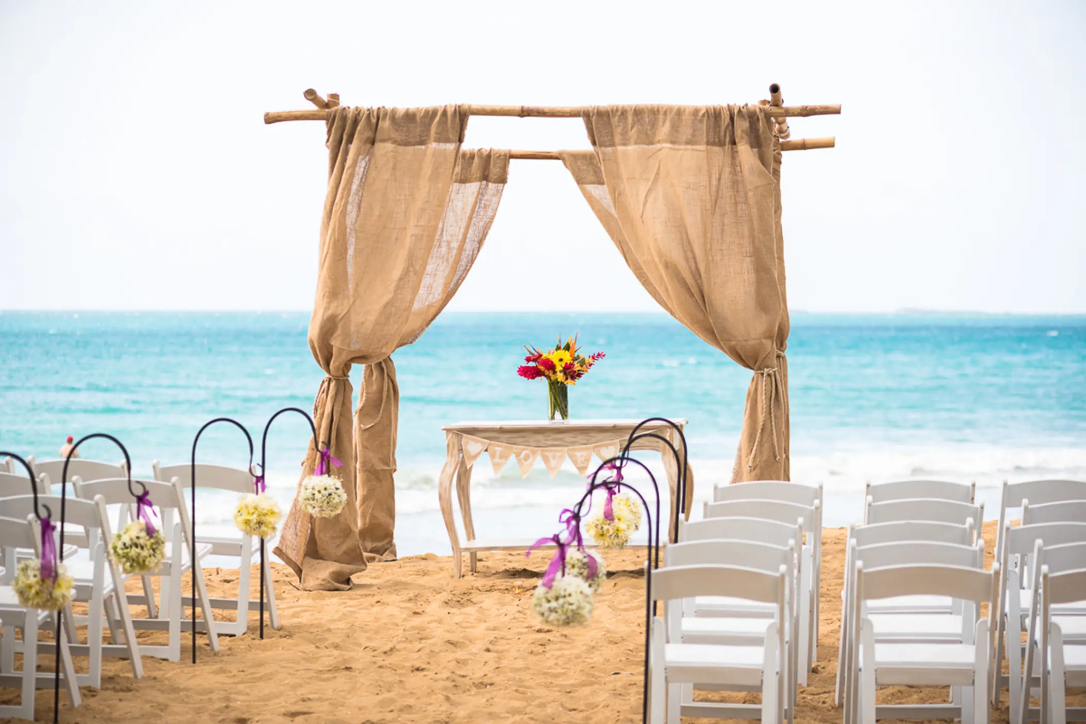 Beachfront wedding ceremony setup at Sublime Samaná, Samana