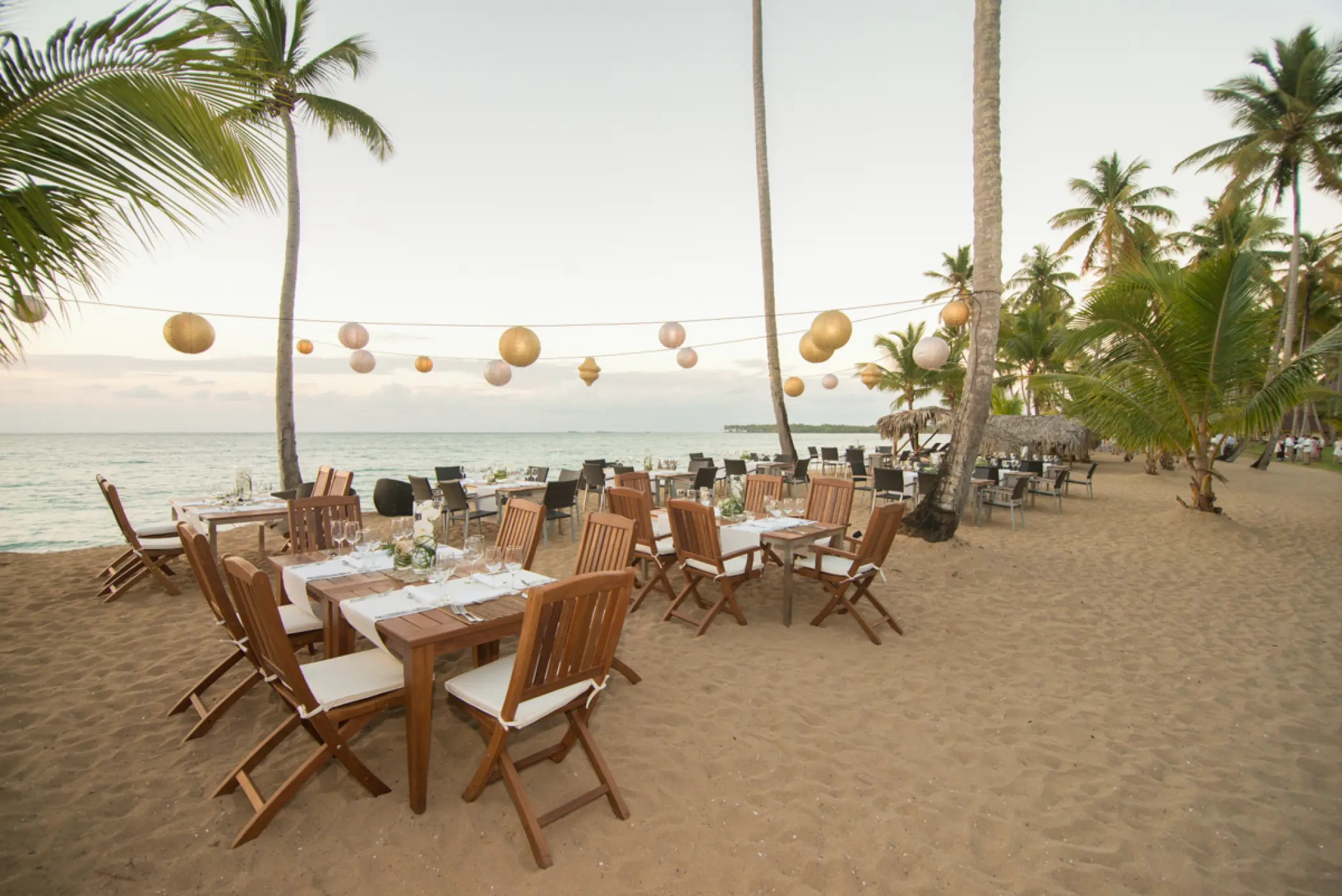 Beachfront wedding reception with paper lanterns at Sublime Samaná, Samana