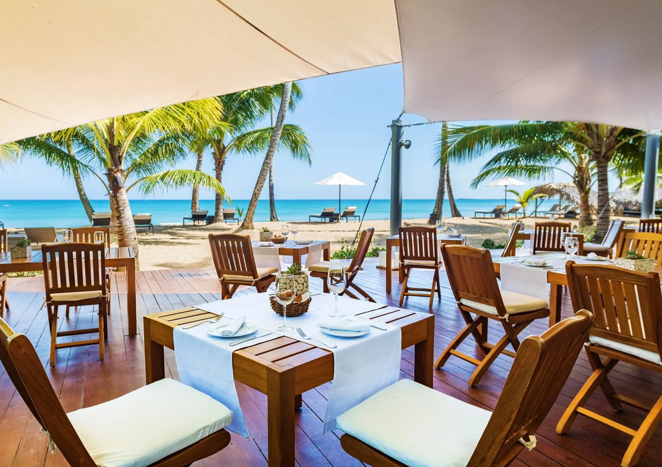 Beachside grill outdoor dining area overlooking the ocean at Sublime Samaná, Samana