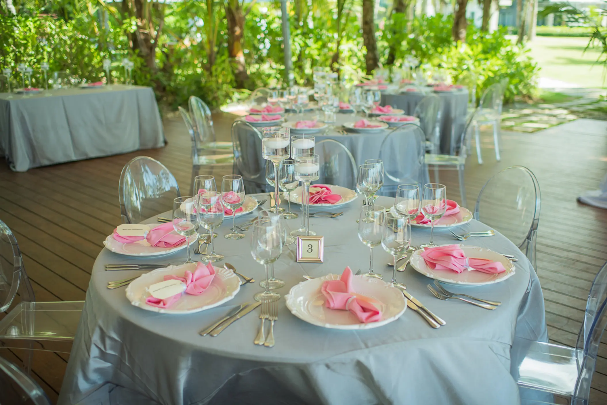 Bistro and terrace wedding reception with pink napkins at Sublime Samaná, Samana