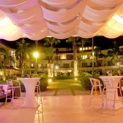 Evening wedding reception terrace with draped ceiling at Sublime Samaná, Samana