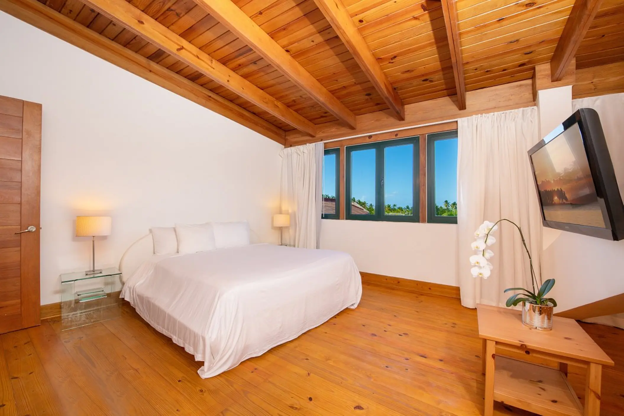 Presidential suite with wood-beamed ceilings and hard-wood floors at Sublime Samana, Samana