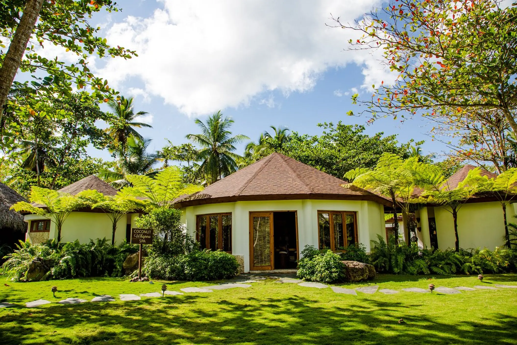 Spa entrance surrounded by tropical gardens at Sublime Samana, Samana