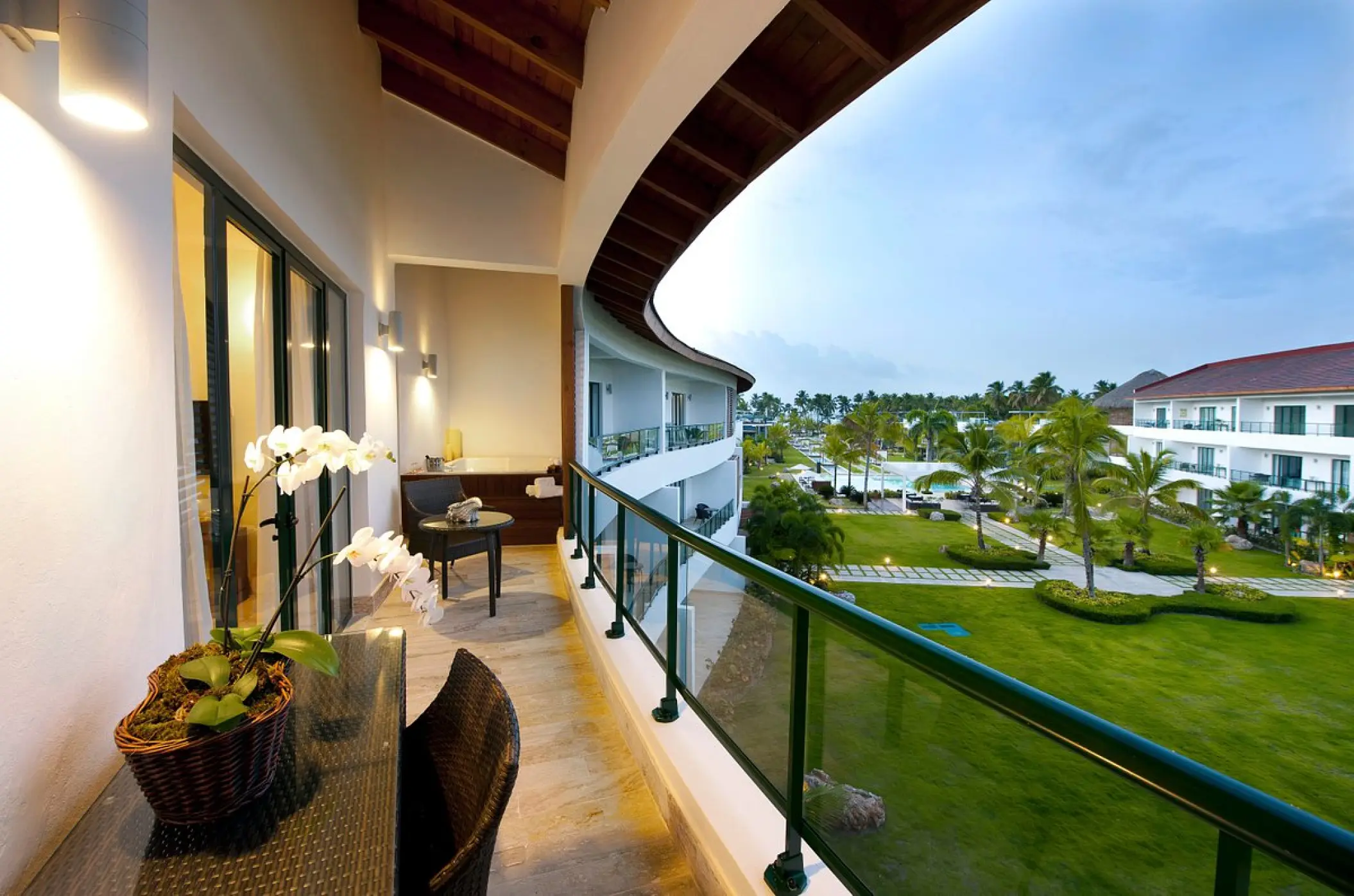 Two-bedroom suite balcony with views of the gardens at Sublime Samana, Samana