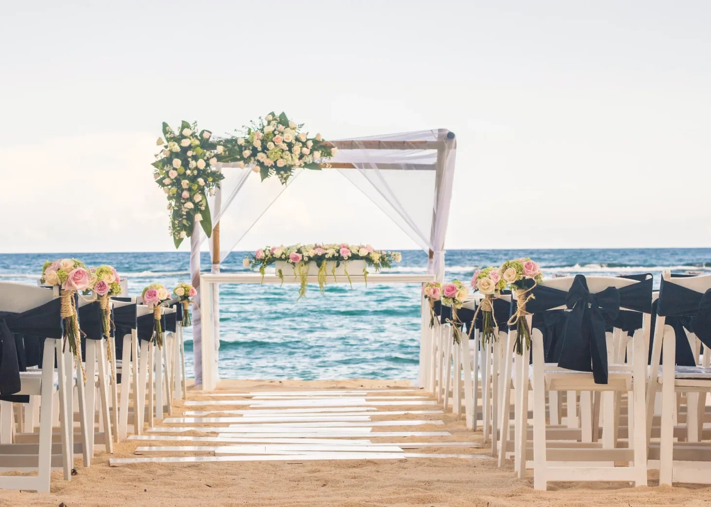 Ceremony decor on beach wedding venue at Sunscape Akumal Beach Resort