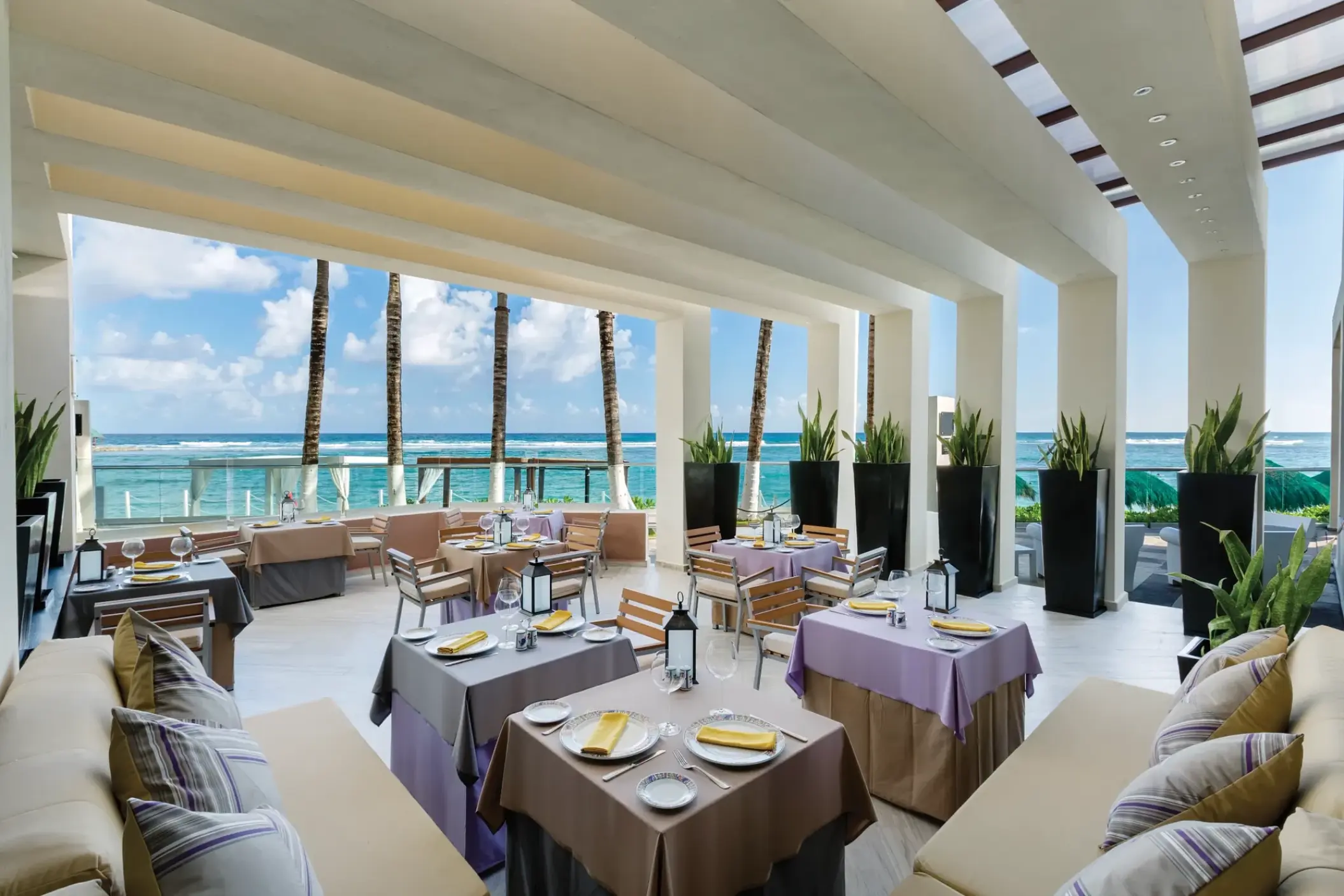 Open-air restaurant with ocean views at Sunscape Akumal Beach, Tulum
