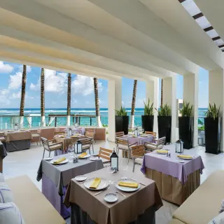 Open-air restaurant with ocean views at Sunscape Akumal Beach, Tulum