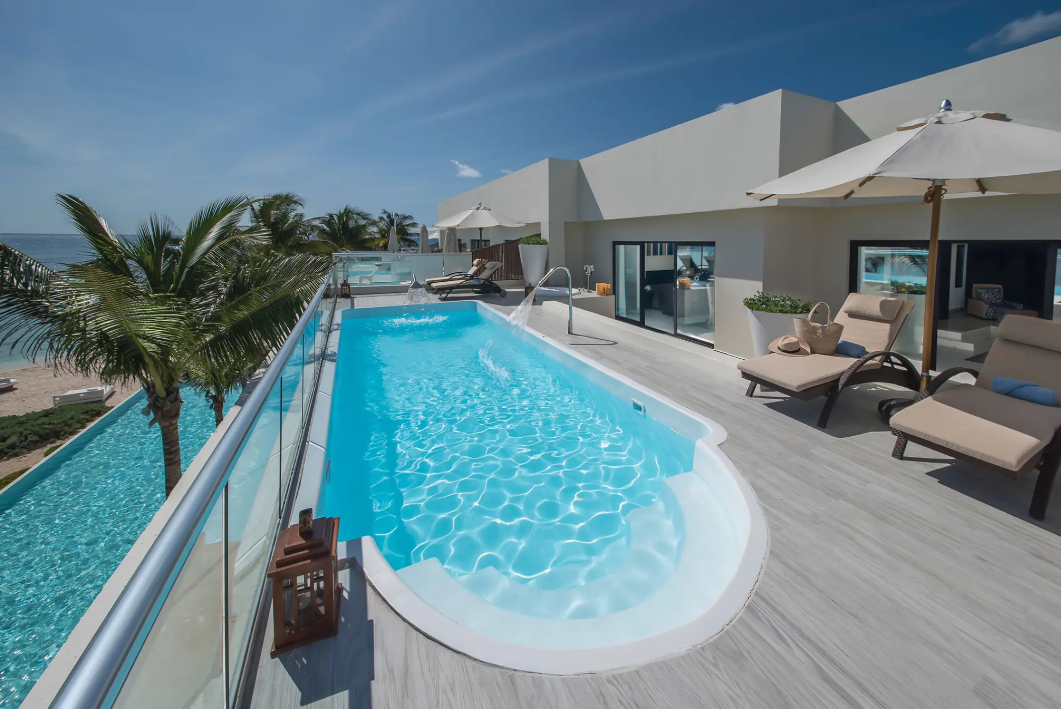Sunscape Akumal presidential suite terrace with private pool and lounge chairs, Tulum