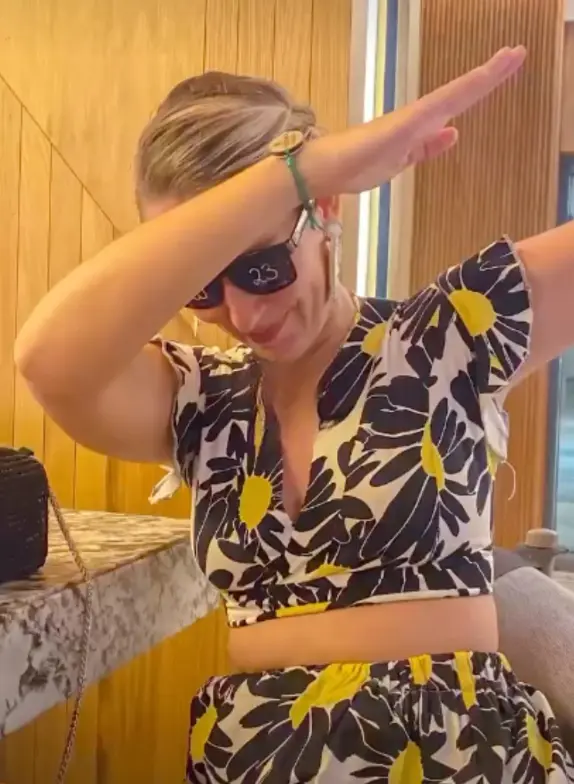 Paradise Weddings staff member in sunglasses doing a dab pose