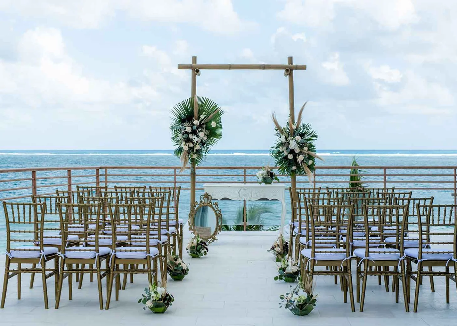 Ceremony decor on al mare terrace at the fives oceanfront puerto morelos