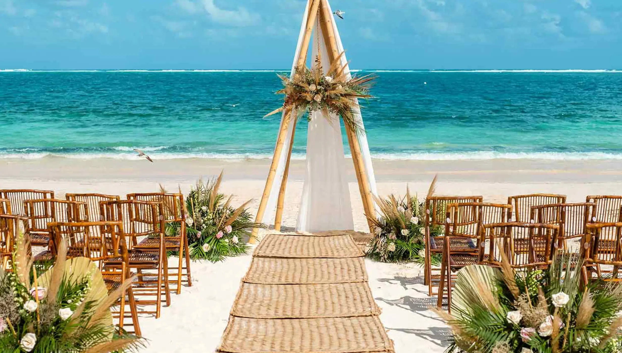 Symbolic ceremony on the beach venue at The Fives Oceanfront Puerto Morelos