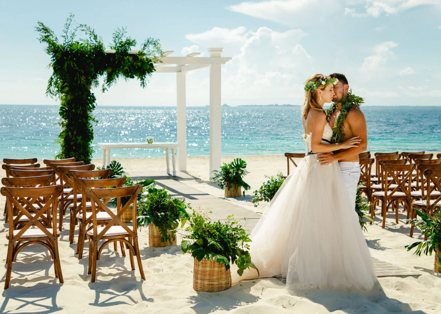 TRS Coral hotel beach wedding ceremony with couple