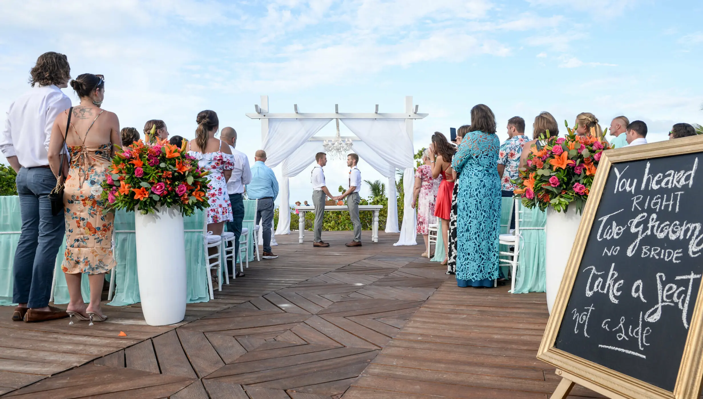 Ceremony decor on the beach deck at Grand Palladium Costa Mujeres